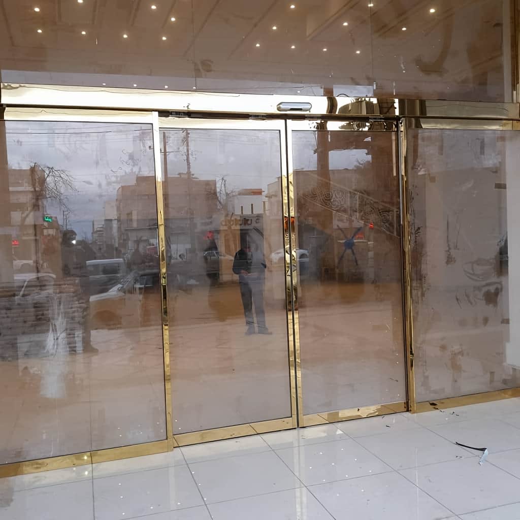 ساخت درب اتوماتیک شیشه‌ای فریم لس سکوریت
